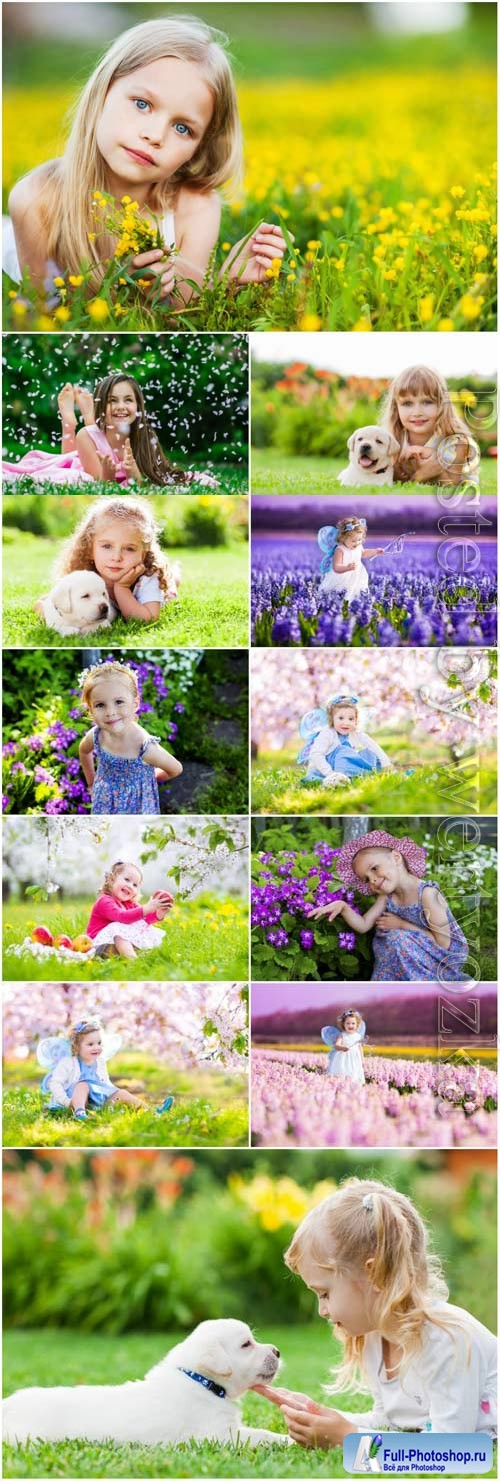 Little girls in flowers stock photo